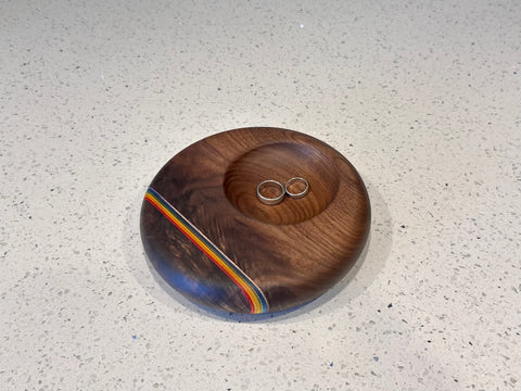 Walnut and rainbow stripe ring pillow with two rings 