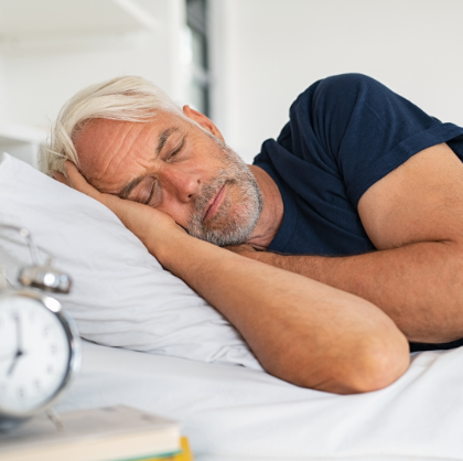 Man Sleeping Comfortably After Receiving Help From The Sleep Institute