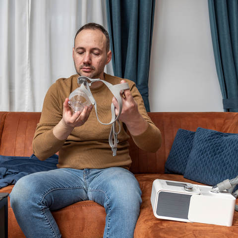 Man Trying to Use His New Cpap Mask From The Sleep Institute