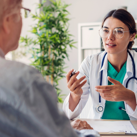 Doctor assisting patient