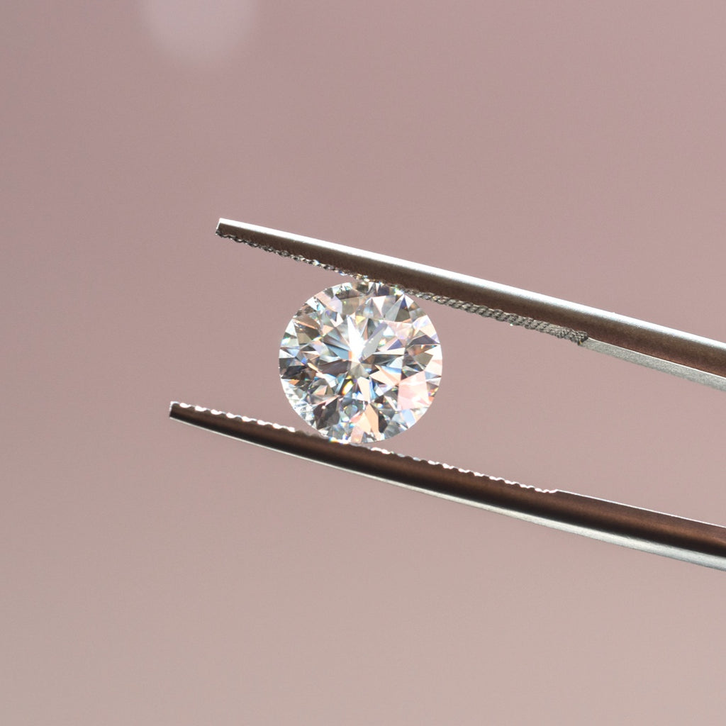 Closeup of diamond in tweezers