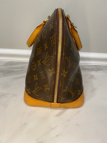 Louis Vuitton Castilian Red Epi Leather Pochette - The Palm Beach Trunk  Designer Resale and Luxury Consignment