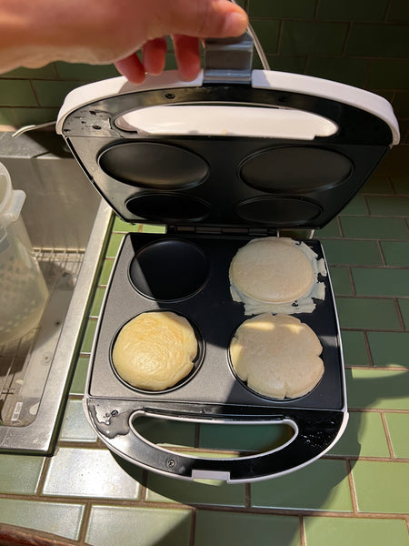 cooking arepas