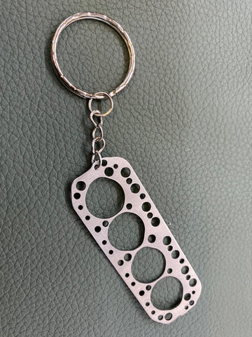 Miniature of a Head Gasket for Austin Mini 1275 Keychain Stainless Steel  brushed – DisagrEE