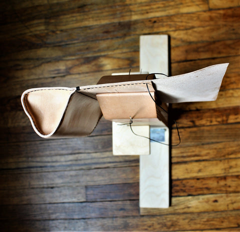 A stitching pony, for saddle stitching in a leather making studio in Vancouver - RG HANDCRAFTED GOODS.