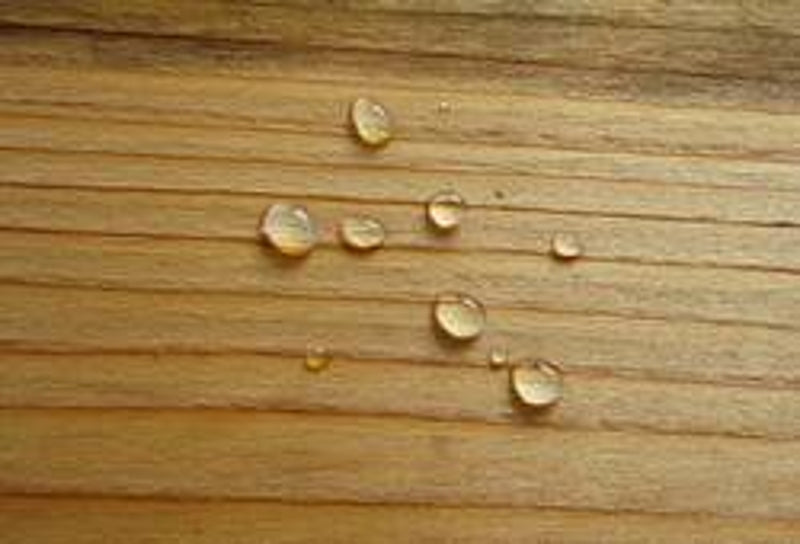 water droplets test on your hardwood floor finishing