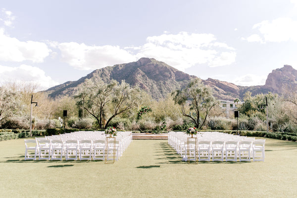 El Chorro Event Lawn beneath Camelback Mountain with garden style florals
