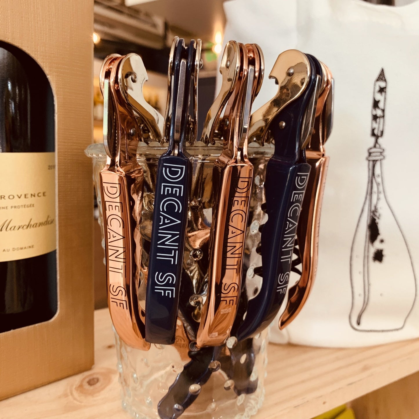 https://cdn.shopify.com/s/files/1/0493/7164/4057/products/decantsf-wine-key-corkscrew-rose-gold-decantsf-439307_1445x.jpg?v=1625017417