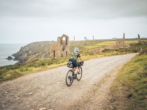 Jo cycling through Botallack