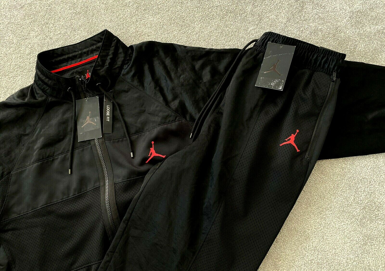 triple black nike tracksuit