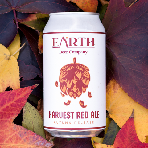 2023 Harvest Red Ale can on autumn leaves