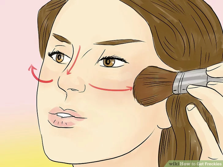 Bước 1: Thoa nhẹ phấn bronzer lên mũi và má.