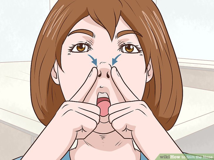 Bước 1: Ấn các ngón tay vào lỗ mũi để làm thon