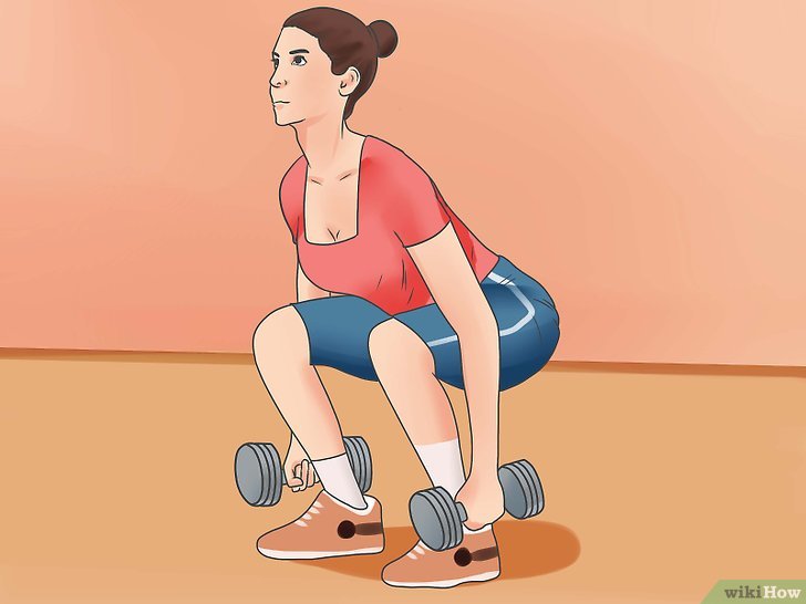 Bước 2: Tập ngồi xổm với tạ là một bài tập thể dục hiệu quả để tăng cường sức mạnh và độ dẻo dai cho cơ bắp chân, mông và lưng.