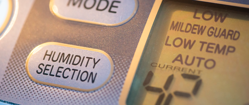 A close up of a dehumidifier control panel, which allows you to perfectly control the humidity levels and general air quality.