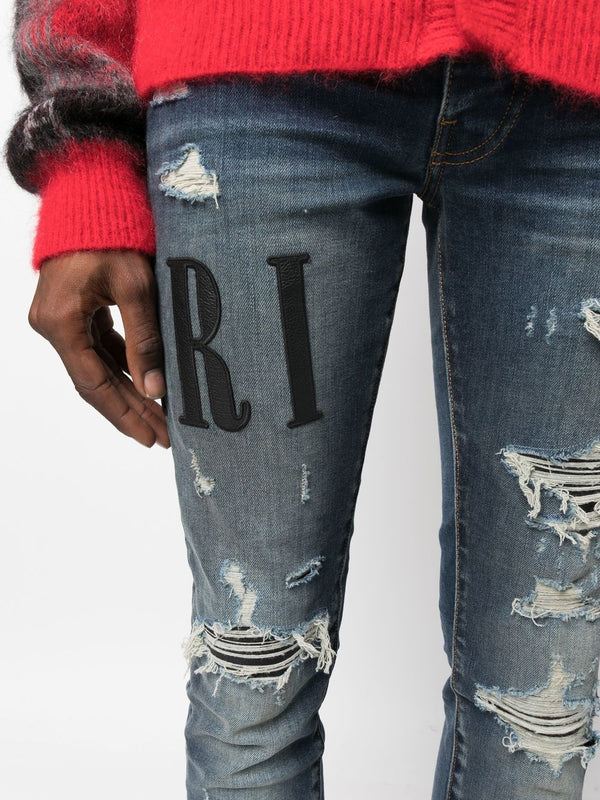 AMIRI paint-splatter skinny jeans – TOPDROP-NEWYORK