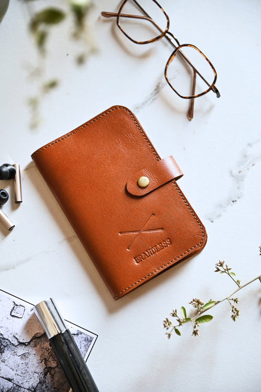 Monogram leather passport holder tan grain – Totême