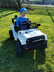 girl dressed as vet nurse in electric vet rescue jeep