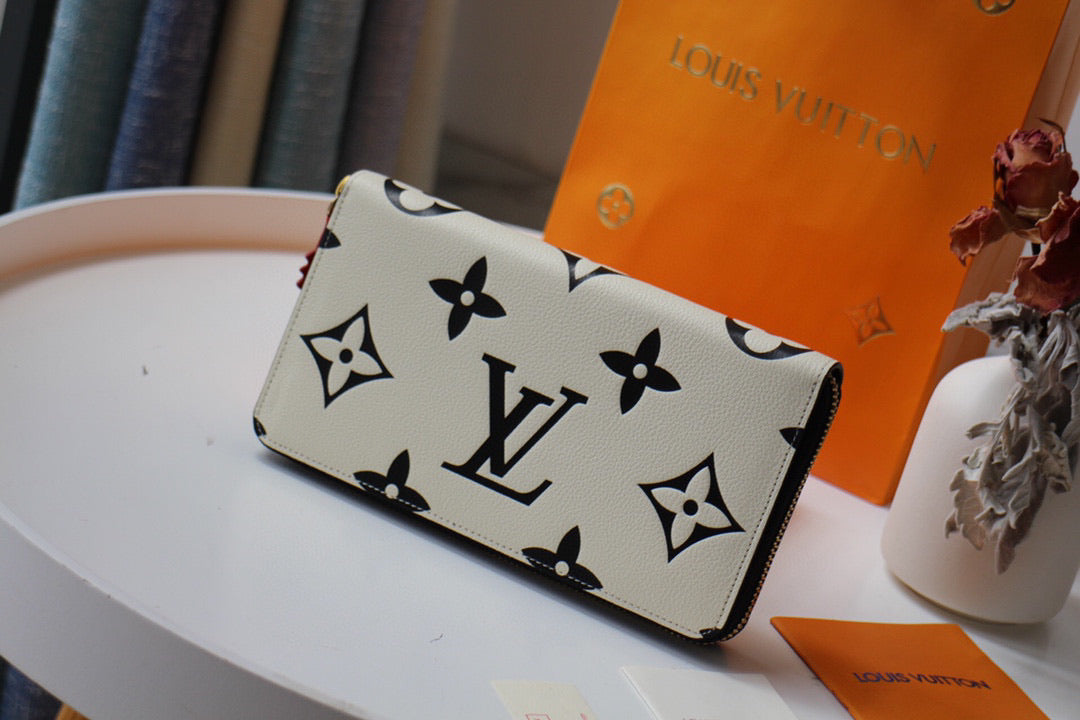 Louis Vuitton Crafty Long Wallet – Luxury Boutique