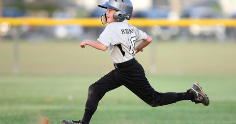 boy playing baseball