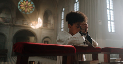 black child praying