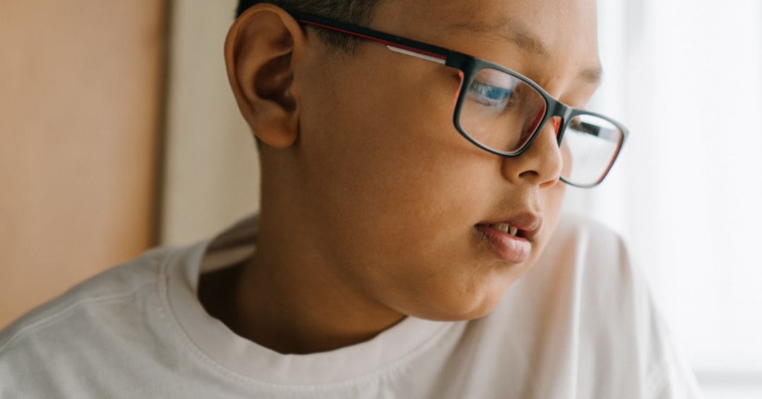 boy wearing glasses