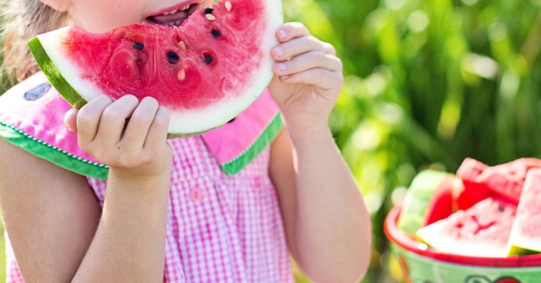 girl eating watermelon