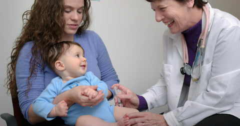 child getting vaccine