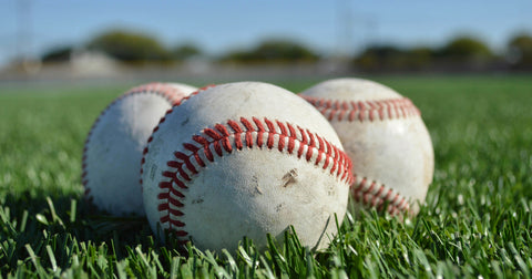 baseballs in field