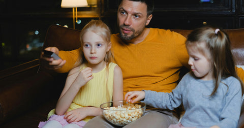 family eating popcorn