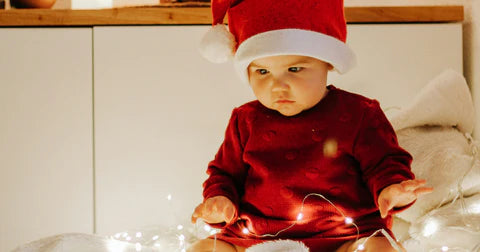baby in santa outfit