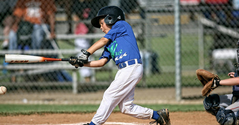 boy playing baseball