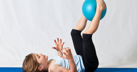 child exercise yoga ball