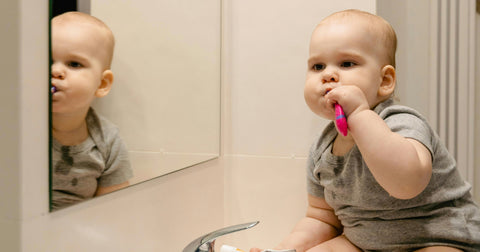 toddler brushing teeth