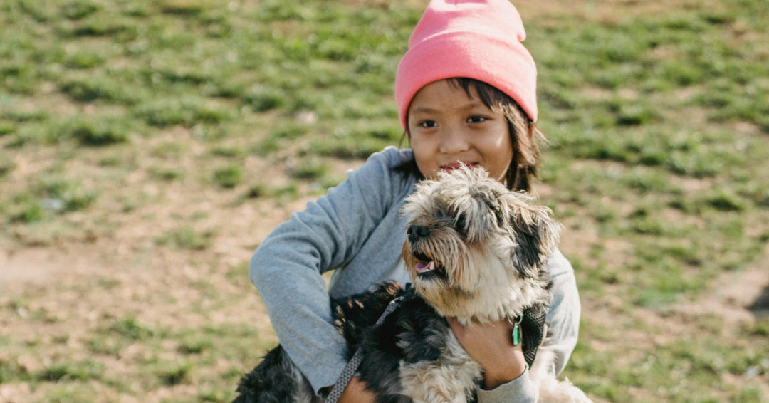 child with dog