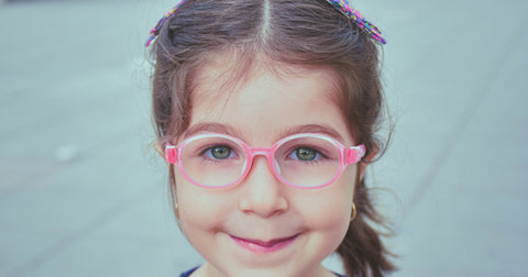 child in glasses
