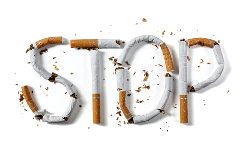 stop tobacco smoking spelled out with broken cigarettes
