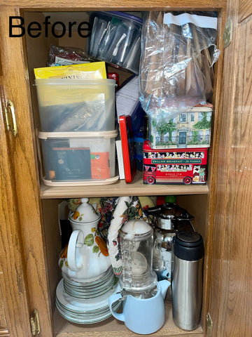 A disorganized tea cabinet