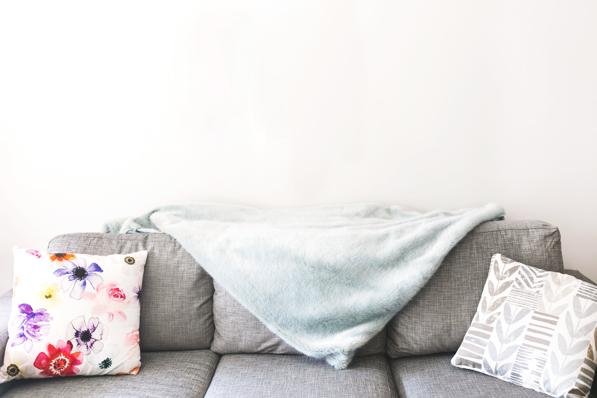 HOW DO I KEEP MY COUCH COVERS FROM SLIDING? – HOTNIU