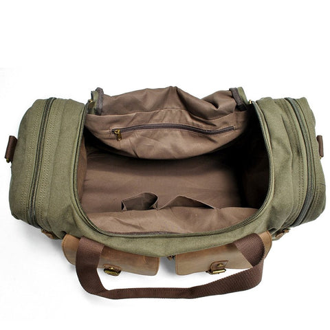 Vintage canvas and leather duffle travel bag