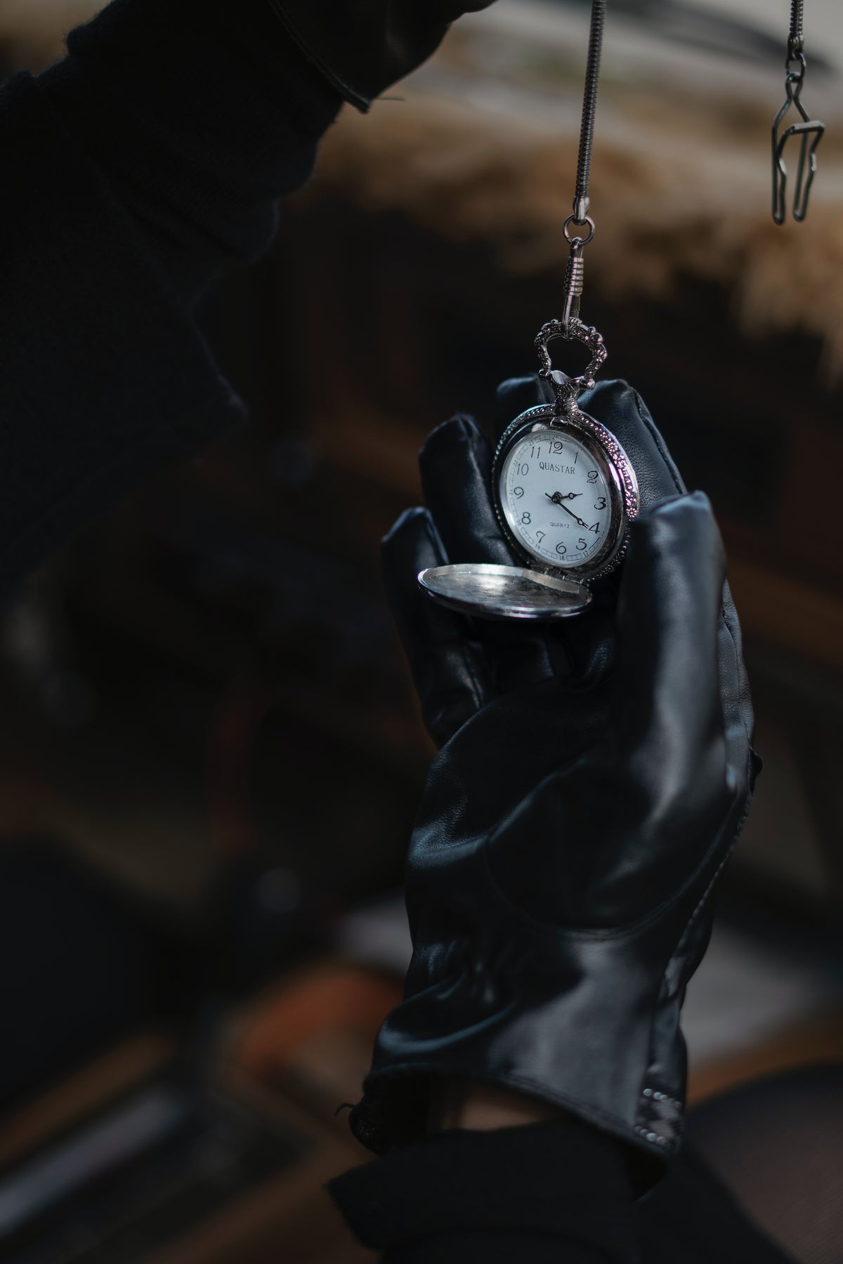Vegan Leather Gloves Holding The Watch