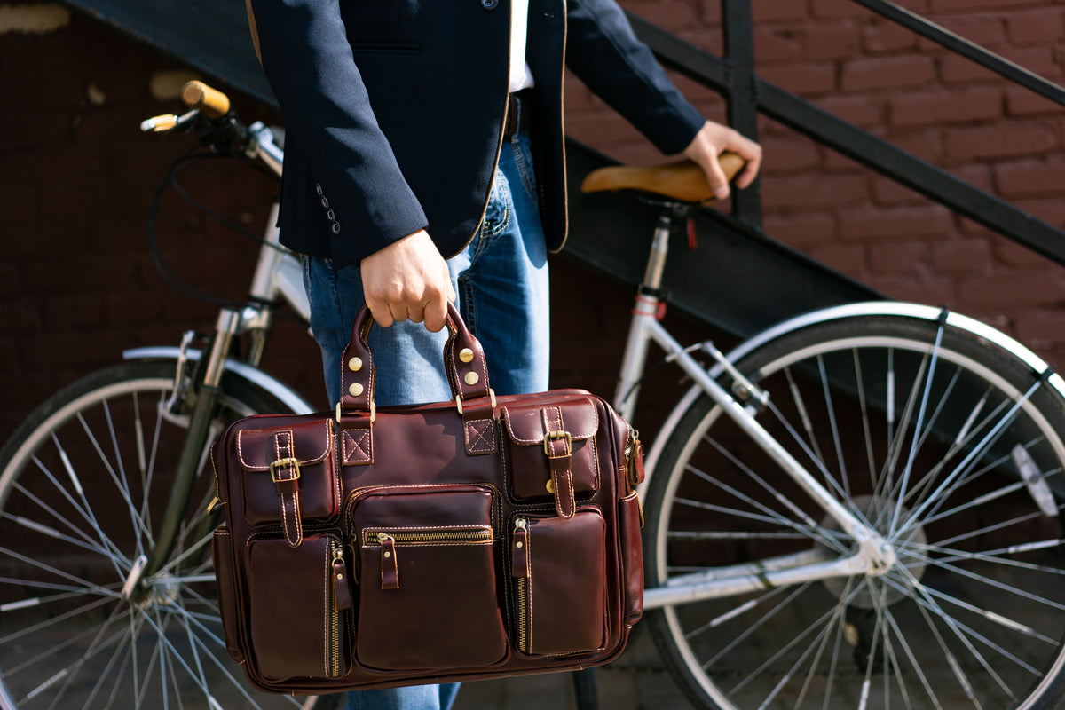  Man Holds Vegan Duffle Bag