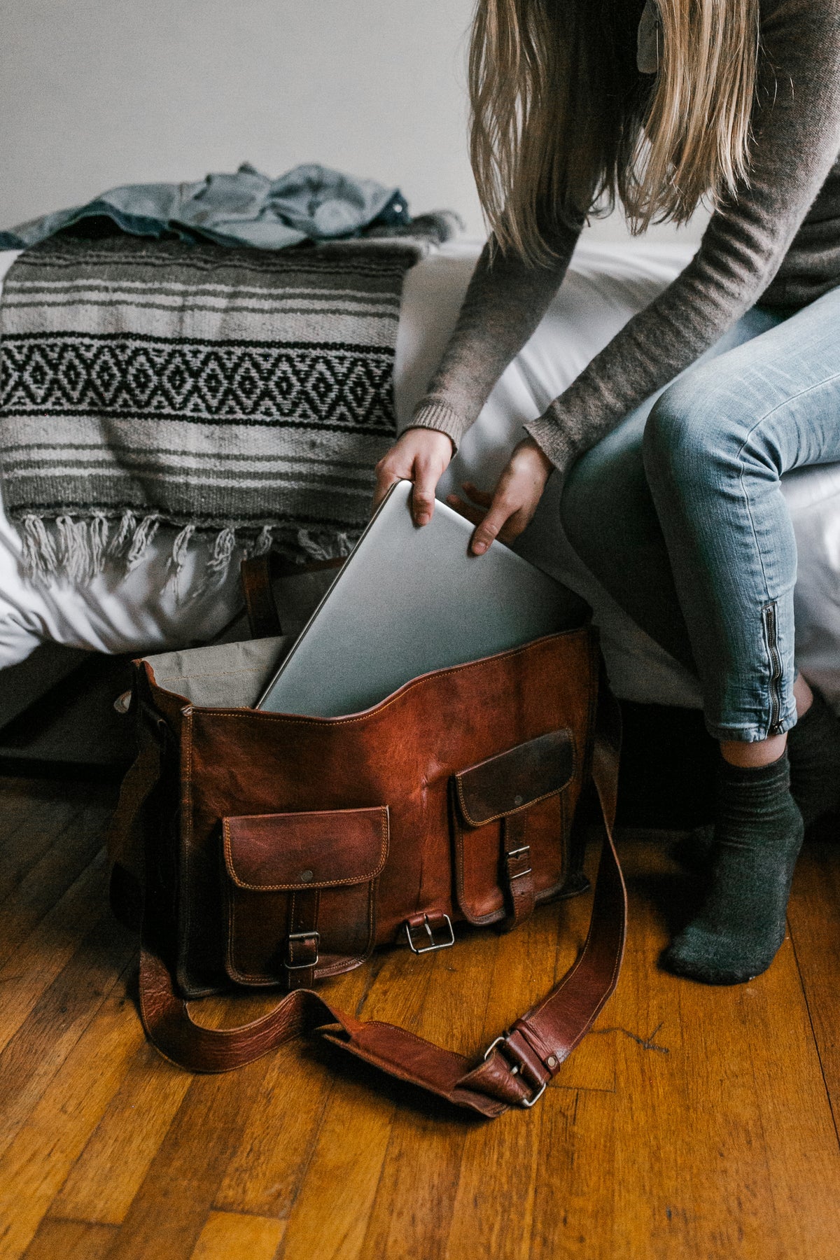 Woman Leaving Laptop In Vegan Leather Bag