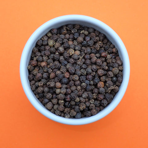 black pepper corns in a bowl