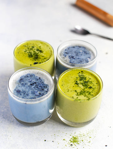 four smoothies, two blue and two green