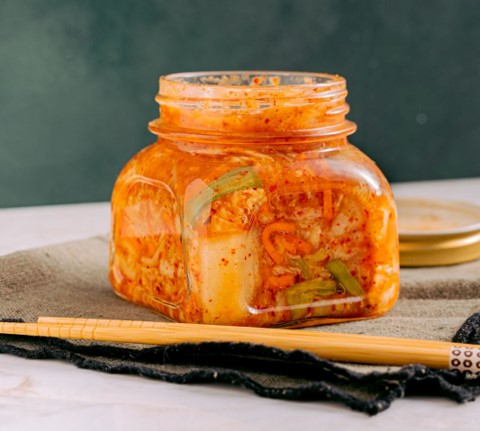 Jar of Kimchi. Kimchi is a traditional Korean banchan consisting of salted and fermented vegetables.
