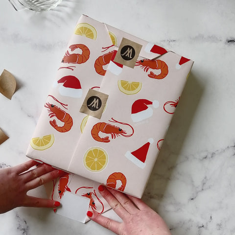 fold woodies paper to wrap present