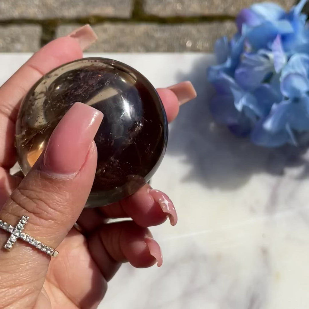 Black Obsidian Mini Palmstone | Honeybee Crystal Company