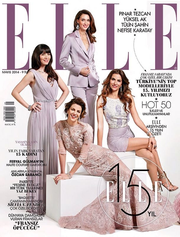 Models Nefise Karatay and Yüksel Ak wearing Begüm Salihoğlu Couture evening gowns on the cover of ELLE magazine's 15th year anniversary!