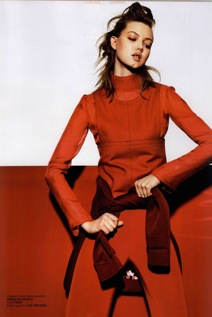Model Lindsey Wixson wearing Begum Salihoglu Couture red top and pants on VOGUE magazine. Styled by Konca Aykan 